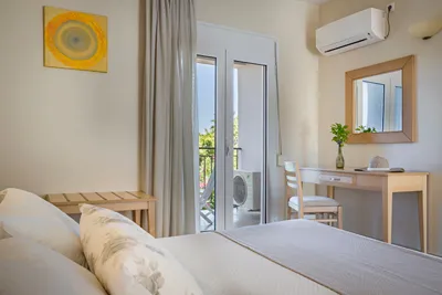 Astra Village Hotel & Suites
